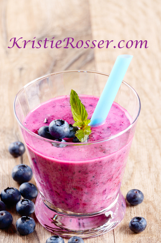 shutterstock_berry blast smoothie blueberries blue straw 429060331