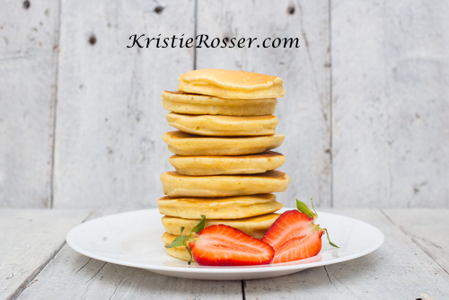 shutterstock_protein pancakes with strawberries on side
