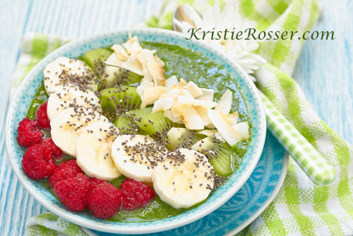 shutterstock_green smoothie bowl with raspberries bananas kiwi an coconut 380471449