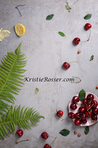 shutterstock_cherries on rustic background 451882861